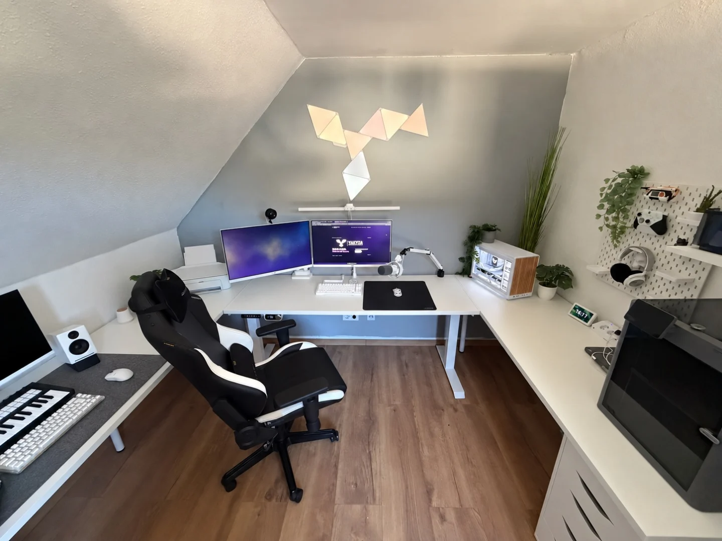 My white gaming room with dual monitors and a white-lit PC